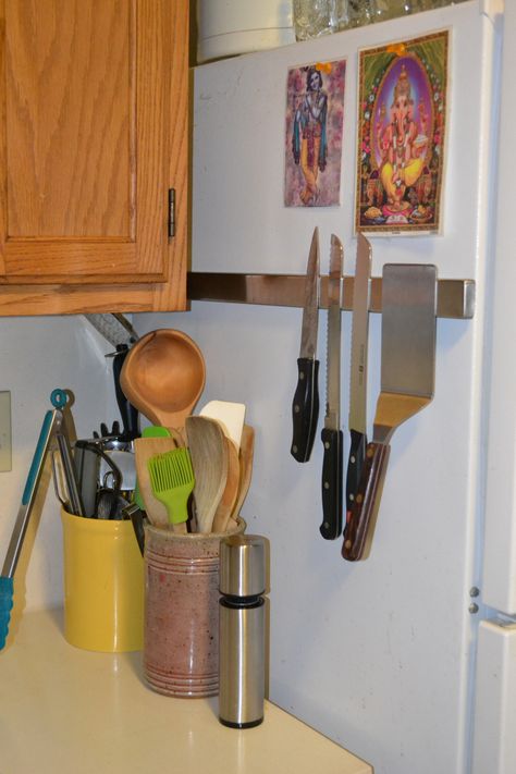 J got some new kitchen knives for Christmas, and both of us try to keep our counters as clear as possible, which means I didn’t spring for the knife block.  In an apartment as small, and with… Side Of Fridge, Knife Magnet, Magnetic Knife Rack, Magnetic Knife Holder, Knife Rack, Space Kitchen, Knife Storage, Kitchen Solutions, Diy Kitchen Storage