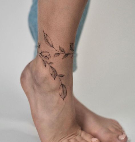 Floral Foot Tattoo, Wrap Around Ankle Tattoos, Back Of Ankle Tattoo, Ankle Foot Tattoo, Browning Tattoo, Wrap Around Tattoo, Magic Runes, Wrap Tattoo, Animal Tattoo Ideas