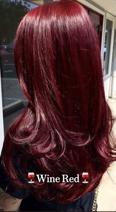 This deep red shade blends purple, copper, and chocolate brown to create a vibrant hair color that embodies the same warmth and richness of the drink that inspires its name. Crimson Hair Color, Blood Red Hair Color, Maroon Red Hair, Vampire Red Hair, Red Hair Without Bleach, Dark Wine Red Hair, Red Wine Hair, Wine Red Hair Color, Vampire Pirate