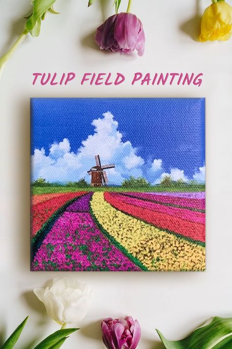 A photo with title 'tulip field painting'. There are five tulips on a white table. In the middle is a painting of dutch tulip fields with a windmill, white clouds and blue sky. It is an acrylic painting on canvas. Une photo avec le titre 'peinture champ de tulipes'. Il y a cinq tulipes sur une table blanche. Au milieu se trouve une peinture de champs de tulipes hollandais avec un moulin à vent, des nuages blancs et un ciel bleu. C'est une peinture acrylique sur toile. Paintings Old, Mini Canvas Paintings, Small Canvas Prints, Tiny Canvas, Field Paint, Tulip Field, Field Art, Field Painting, Tulip Painting