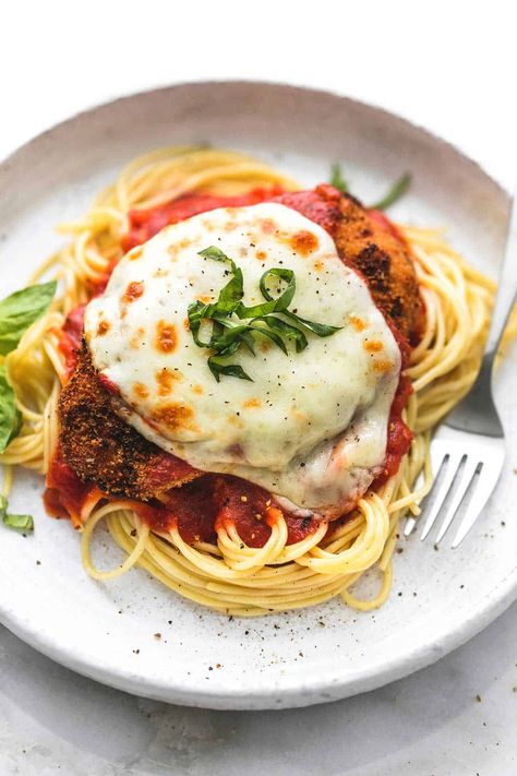 Easy and Healthy Baked Chicken Parmesan is a delicious and simple 30 minute meal you'll make again and again. | lecremedelacrumb.com Veal Parmesan Recipe, Chicken Parmesan Recipe Healthy, Veal Parmesan, Chicken Parm Recipes, Traditional Spaghetti, Chicken Parmesan Recipe Baked, Healthy Chicken Parmesan, Veal Cutlet, Chicken Parmesan Recipe