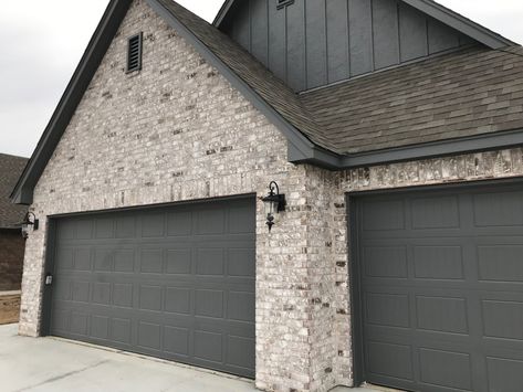 Brick and Painted Garage doors Brick Homes, Gray Brick House Exterior, Grey Brick House Exterior, Grey Brick Houses, Light Brick, Grey Brick, Brick Colors, Brick Exterior House, House Siding