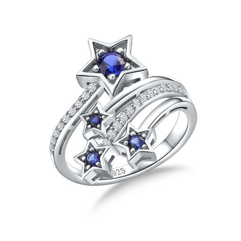 PRICES MAY VARY. SAPPHIRE STAR RING -- The star ring is a multi-layer style with four layers of interlocking bands, each adorned with a beautiful small star. 925 STERLING SILVER RING -- Crafted in hypoallergenic 925 sterling silver with 14k white plating, this star rings ensures exceptional durability, long-lasting shine and great comfort to fit. WOMEN'S STATEMENT RING -- The star statement ring decorated with created sapphire and created white sapphires. These blue gemstones are carefully selec Blue Star Ring, Star Jewellery, White Rings, Star Rings, Star Sapphire Ring, Sapphire Rings, Ringe Gold, Star Sapphire, Layer Style