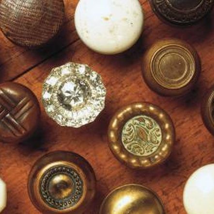 Comstock Images/Comstock/Getty Images Glass Door Knobs Crafts, Door Knobs Crafts, Diy Door Knobs, Old Door Knobs, Craft Shelves, Diy Coat Rack, Diy Knobs, Kitchen Door Knobs, Kitchen Wine Rack