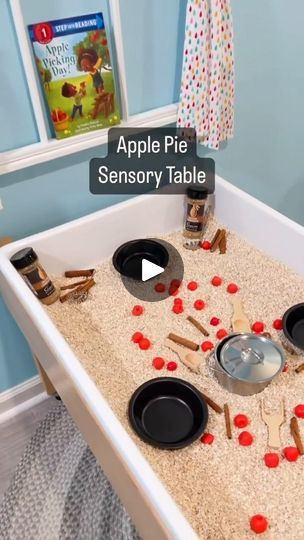 4.5K views · 569 reactions | Apple Pie Sensory Table🥧 🍎Dry oatmeal base 🍏Tiny pie tins 🍎Apple counters 🍏Cinnamon sticks 🍎Cinnamon shakers 🍏Wooden scoops 🍎Soup pot  The focus of our sensory table varies each week. Sometimes, we work on fine motor skills and coordination. Other times, it has a math or literacy focus. This video focuses on sensory dramatic play by making little “apple pies". In addition to the sense of touch, it smells great because of the cinnamon!  Looking for more apple ideas? 🍎 Comment "APPLE" if you'd like a link to a 10-day Apples Circle Time Unit! Everything is ready for you... just print and go! 👋  #PreschoolTeacher #PlayMatters #PlayMore #PlayIsEnough #PreKTeachers #PlayBasedLearning #EarlyChildhoodEducation #PreschoolTour #LearningThroughPlay #PreschoolAct Tiny Pies, Jamie White, Apple Ideas, Pie Tin, Playbased Learning, Wooden Scoop, Sense Of Touch, Apple Pies, Rosh Hashana