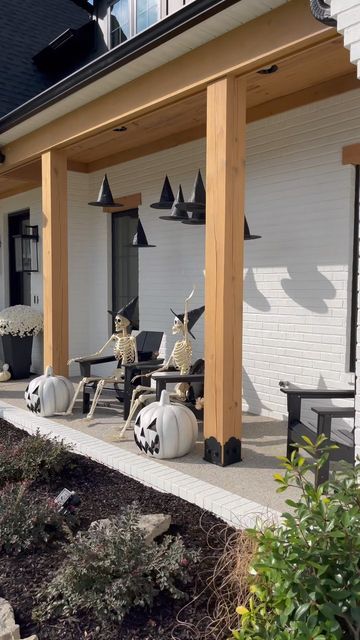 Tiffany | Myrusticmodernhome on Instagram: "September 1st! Are y’all ready for this?! 👻 if you catch my stories these jack o lanterns are now being sold online, I have them linked and we have loved ours! If I can catch Skelly @homedepot you bet I’m getting him! bring on all things spooky! #fy #fyp #halloween #halloweendecoration #exterior #trending #modernfarmhouse #skeleton" Ranch House Halloween Decor, Modern Farmhouse Outdoor Halloween Decor, Halloween House Decorations Exterior, Halloween Decor Outdoor Front Porches, Exterior Home Halloween Decor, Long Porch Halloween Decor, Cute Halloween Exterior Decor, Pretty Outdoor Halloween Decor, Halloween Home Exterior Decor