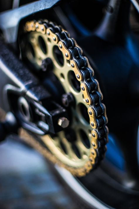 Motorcycle chain and sprocket. Download this photo by Conor Luddy on Unsplash Mountain Biking Quotes, Mountain Biking Photography, Hd Motorcycles, Mountain Biking Women, Mountain Biking Gear, Suspension Bike, Motorcycle Wallpaper, Bike Photoshoot, Motorcycle Chain