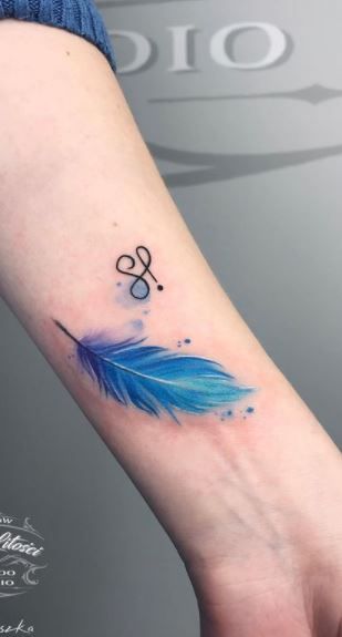 Bluebird Feather Tattoo, Feather Semi-colon Tattoo, Blue Bird Feather Tattoo, Bluejay Feather Tattoo, Feather Wrist Tattoos For Women, Blue Feather Tattoo, Meaning Of Feather Tattoo, Feather Tattoo Ideas For Women, Watercolor Feather Tattoo