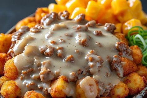 Tater Tot Breakfast Bowl with Sausage Gravy Recipe - recipestasteful Tater Tot Breakfast Bowl With Sausage Gravy, Sausage Gravy Tater Tot Casserole, Tater Tot Breakfast Bowl, Bacon Gravy, Sausage Gravy Recipe, Fluffy Scrambled Eggs, Tater Tot Breakfast, Productive Morning, Spicy Sausage