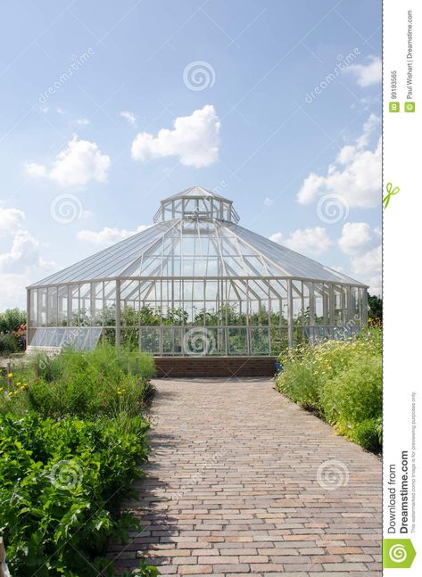 Photo about Large round greenhouse with path in foreground. Image of inside, botany, production - 99193565 Round Greenhouse, Conservatory Greenhouse, Conservatory Design, Greenhouse Cover, Landscape Design Drawings, Large Greenhouse, Event Hall, Water Fountains Outdoor, Apartment Architecture