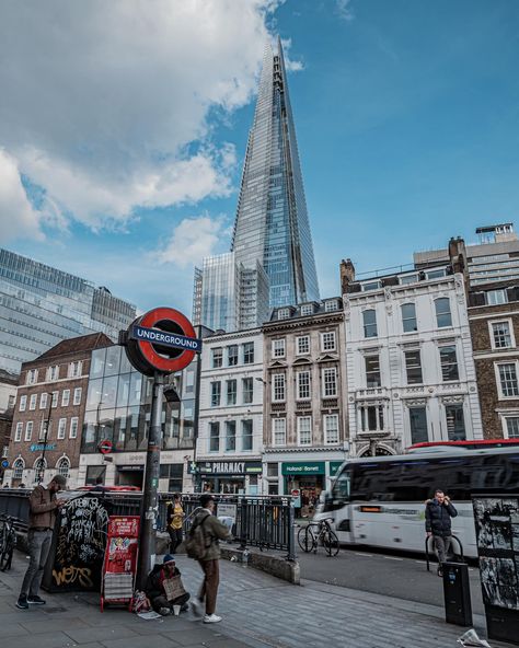 London Bridge underground overshadowed by the Shard London Bridge is a central London railway terminus and connected London Underground station in Southwark, south-east London. It occupies a large area on three levels immediately south-east of London Bridge, from which it takes its name. The main line station is the oldest railway station in London fare zone 1 and one of the oldest in the world having opened in 1836. It is one of two main line termini in London to the south of the River Tham... South East London, The Shard London, London Underground Stations, Underground Station, The Shard, Urban Architecture, Writing Project, London Underground, London Bridge