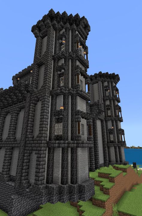 Minecraft castle or keep towers in our survival world. Minecraft Wall Tower, Minecraft Andesite House, Minecraft Basalt Builds, Minecraft Building Ideas Towers, Minecraft Keep Ideas, Blackstone Tower Minecraft, Deepslate Buildings, Dark Tower Minecraft, Deepslate Minecraft Buildings