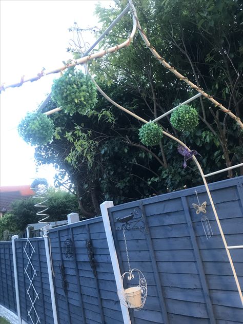 Wonderland back garden makeover. Patio 2.   Cornflower blue fences, Egg chair, vintage arch, apple crates and some quirky decorations!! Fence Colours, Blue Fence, Apple Crates, Chair Vintage, Garden Makeover, Blue Back, Garden Fence, Back Garden, Egg Chair