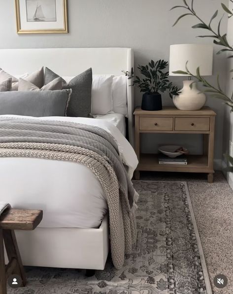 Gray Wall Guest Bedroom, Blue Grey Neutral Bedroom, Neutral And Black Master Bed, Master Bedrooms Gray Walls, Greige Master Bed, Bedroom Inspirations Master Grey Carpet, Grey Beige Bedding, Master Bedrooms Window Behind Bed, Gray Guest Room Ideas