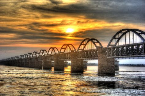 The Godavari is India's second longest river after the Ganga. Its source is in Triambakeshwar, Maharashtra. It flows east for 1,465 kilometres, draining the states of Maharashtra, Telangana, Andhra Pradesh, Chhattisgarh, Odisha, ultimately emptying into the Bay of Bengal through its extensive network of tributaries. Rajahmundry Godavari, Mahanadi River, Rivers In India, Godavari River, Yamuna River, Indus River, Brahmaputra River, Ganga River, Narmada River