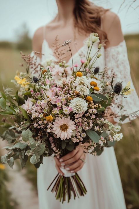 These 31 romantic summer wildflower bouquets are perfect for your big day! Celebrate love with lush, vibrant blooms in these unforgettable designs. Click to explore! #romanticbouquets #summerlove #wildflowerwedding Wild Flower Backyard Wedding, Wedding Wild Flowers Bouquets, Wildflower Summer Bouquet, Eucalyptus And Wildflower Bouquet, Wedding Colors Wildflowers, Summer Wedding Colors Wildflowers, Dark Green Wildflower Wedding, Wildflower Inspired Wedding, Spring Flower Bridal Bouquet