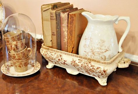 Brown transferware. Cups stacked under a cloche, pitcher and books in a rectangular bowl. Antique Booth Displays, Antique Booth Ideas, Dish Display, Vintage Vignettes, Living Vintage, Interior Vintage, Brown Transferware, Antique Dishes, French Country Farmhouse