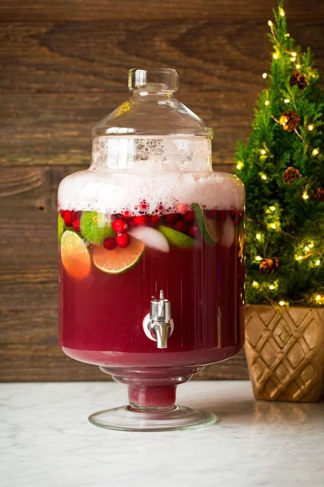 This Christmas Punch has been my go-to holiday drink for 10+ years! It's so delicious and perfectly festive! And it only takes minutes to make. Holiday Punch Recipe, Juice Pineapple, Christmas Party Drinks, Christmas Punch Recipes, Holiday Punch, Christmas Punch, Almond Extract, Party Punch, Christmas Brunch