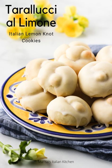 Tarallucci al Limone are Italian lemon knot cookies and extremely easy to make. These traditional Italian cookies are soft, cake-like and dipped in a lemon glaze. Lemon Knot Cookies, Traditional Italian Cookies, Knot Cookies, Traditional Italian Food, Italian Lemon Cookies, Italian Biscuits, Lemon Drop Cookies, Italian Christmas Cookies, Lemon Cookies Recipes