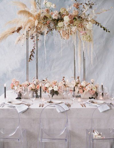 Check out ALENASAYS.COM for more wedding ideas and inspiration! #weddings #weddinginspiration Pampas Grass Backdrop, Wedding Table Planner, Winter Wedding Table, Minimalist Dekor, Boda Diy, Wedding Table Linens, Winter Wedding Decorations, Grass Wedding, Wedding Floral Centerpieces