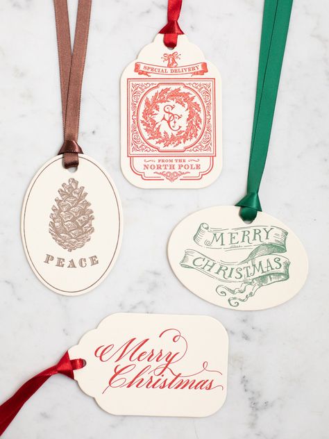 Make the art of gift-giving even more delightful with our Christmas Tags. Crafted with letterpress printing on sturdy cotton paper, these tags elevate your gifts. - DETAILS - Set of 8 letterpress print tags and 8 satin ribbons. Measures 2.5'' by 4'' Made of 220 lb cotton paper. Made in Farmington, UT. Minimalist Christmas Gift Tags, Ornament Name Tags, Letterpress Gift Tags, Pink Christmas Tags, Christmas Watercolor Gift Tags, Brand Tag Design, Cricut Christmas Tags, Cricut Christmas Gift Tags, Christmas Branding