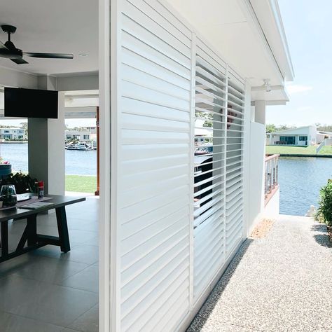 Outdoor Sliding Shutters, External Shutters, Privacy Porch, Outdoor Window Shutters, Shutters With Curtains, Porch Party, Bahama Shutters, Stacking Doors, Pool Pavilion