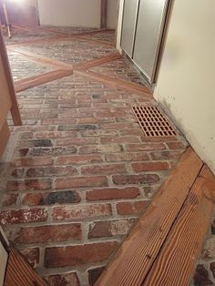 DIY:  How to Install a Brick Veneer Farmhouse Floor - this post shows how salvaged 2x4's, Durock and brick veneers were installed on a plywood base. This looks like an authentic 100 year old farmhouse floor - via 1900 Farmhouse:  Kitchen Floor Farmhouse Kitchen Floor, Brick Floor Kitchen, 1900 Farmhouse, Best Flooring For Kitchen, Brick Floor, Farmhouse Flooring, Brick Veneer, Brick And Wood, Floor Remodel