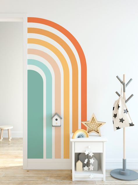 Wall Decals For Playroom, Rainbow Paint On Wall, Half Rainbow Wall Mural, Pastel Colors Painting Ideas, Daycare Wall Colors, Rainbow Accent Wall Paint, Corner Rainbow Wall, Playroom Rainbow Wall, Nursery Rainbow Wall