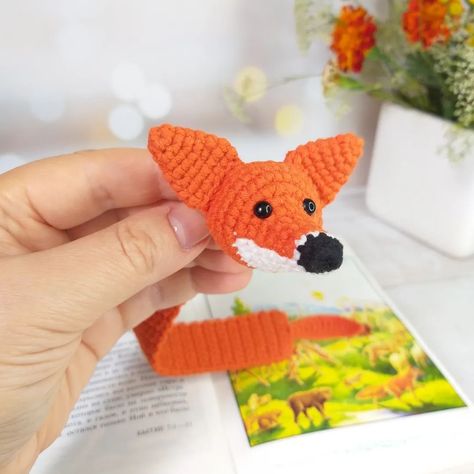 Just in time for International Crochet Day, I’ve finished this cute fox bookmark! 🦊🍂 What projects are you working on to celebrate? 🍁🍁🍁🍂🍁🍁🍁🍂🍁🍁🍁 International Crochet Day, crochet bookmark pattern, fall crochet, fox crochet, amigurumi fox pattern @fainacutetoys #fallcrochet #internationalcrochetday #amigurumicrochet #crochetfox #crochetbookmark Fox Bookmark, Amigurumi Fox Pattern, Fox Crochet, Bookmark Pattern, Crochet Bookmark Pattern, Crochet Bookmark, Amigurumi Fox, Fox Gift, Fall Crochet