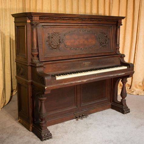 This piano is made of beautiful burl walnut wood with exquisitely carved panels, moldings and trusses. The instrument is quite large and handsome in person, yet it maintains a formal and elegant overall appearance.   Not only is this instrument a beautiful piece of furniture, but it is a quality musical instrument. Shop now on our website! #pianoforsale #uprightpiano #antiquepiano #antique #antiquefurniture #antiqueinstrument #instrument #music #musichistory #homedecorinspo #qualitycraftsmanship Piano Old Aesthetic, Vintage Upright Piano, Regency Piano, Beautiful Grand Piano, Piano Store, Piano Restoration, Piano Shop, Brown Grand Piano, Piano For Sale