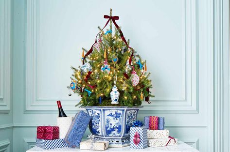 Small-space living calls for thinking outside of the box. Here are small Christmas tree ideas that deliver big holiday cheer. Small Christmas Tree Ideas, Christmas Loft, Chinoiserie Christmas Tree, Blue Christmas Stocking, Blue And White Bowl, Colorful Christmas Decorations, Christmas Place Settings, Blue And White Christmas, Blue Christmas Ornaments