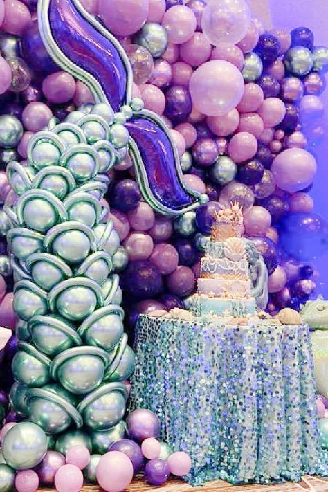 Mermaid birthdays are always a popular theme with girls and a Sweet 16 is no different. Just imagine how much sophistication you can bring to the party with beautiful decor and party food. See more party ideas and share more at CatchMyParty.com Mermaid Theme Balloon Decor, Mermaid Tail Balloon Garland, Balloon Mermaid Tail, Mermaid Balloon Column, Mermaid Balloon Decor, Mermaid Party Balloons, Unique Balloon Ideas, Little Mermaid Balloon Garland, Mermaid Birthday Party Balloons