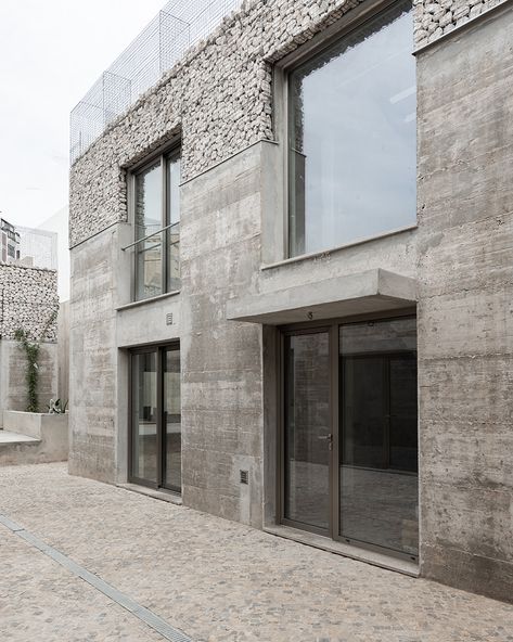 corpo atelier unveils three exposed concrete and stone facades in portugal Exposed Concrete Facade, Mad Architects, 2023 Picture, Faro Portugal, Concrete Facade, Concrete Architecture, Metal Grid, Stone Facade, Concrete Stone