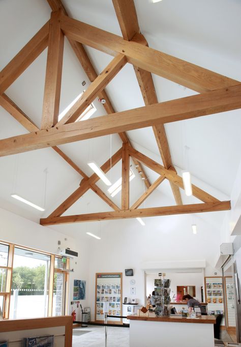 Contemporary truss Exterior Truss Design, Roof Truss Design Exposed Beams, Truss Ceiling Exposed, Exposed Timber Trusses, Heavy Timber Trusses, Exposed Trusses, Gable Window, Beams Living Room, Wood Truss