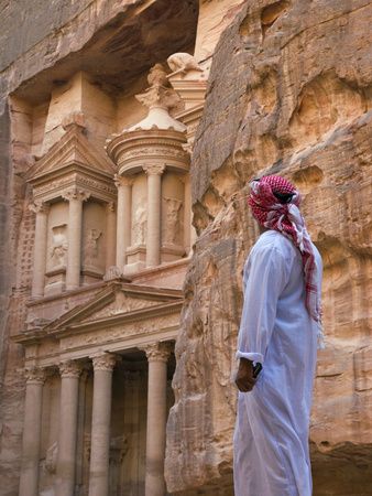 Arab Man Watching Facade of Treasury (Al Khazneh), Petra, Jordan at Allposters.com at AllPosters.com Traditional Outfits African, Arabic Culture, Culture Aesthetic, Persian Women, African Goddess, Arabian Night, Petra Jordan, Arab Men, Arabian Nights