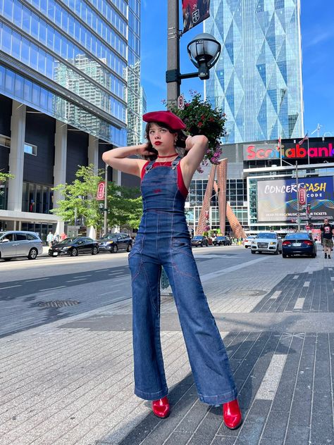 Denim overall, red tee, red boots and a red French beret for the Harry Styles Love On Tour show/concert in Toronto Harrys House Inspired Outfits, Harry Styles Aesthetic Outfits Concert, Love On Tour Outfits Aesthetic, Harry Tour Outfits, Harry Styles Jeans Outfit, Harry Styles Outfit Aesthetic, Harry Styles Hslot Outfits, Harry Styles Inspired Outfits Concert, Concert Outfits Harry Styles