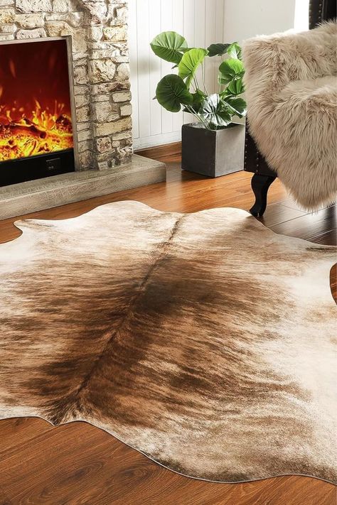 The Cow Hide Rug - a timeless piece that transcends decor trends and has been cherished for its beauty and durability for centuries. Whether it graces your living room, bedroom, or even your home office, the Cow Hide Rug adds warmth, texture, and character to your space. Its natural markings create a unique focal point that can enhance a variety of decor styles. #CowHideRug #NaturalDecor #HomeDecor #RugArtistry Wall Decor Western, Cow Print Rug, Print Rugs, Carpet For Bedroom, Decor Western, Hide Rug, Cow Skin, Cowhide Rug, Floor Carpet