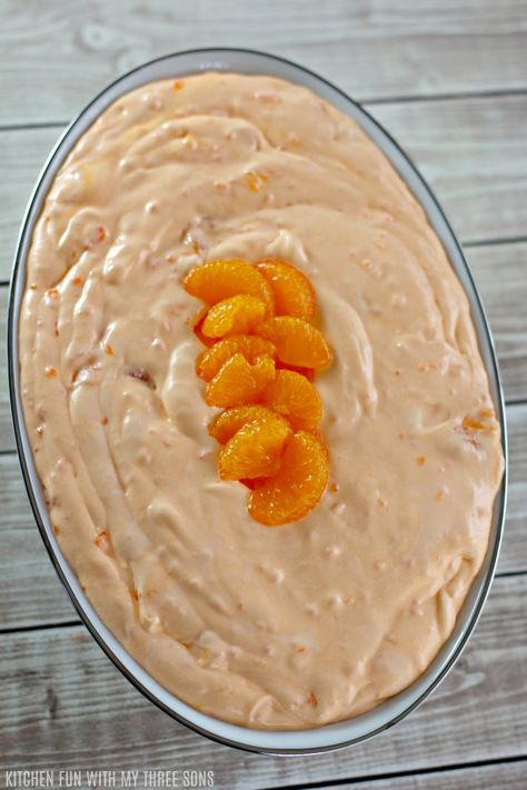 Looking for a fun and sweet summer treat? Make this Easy Jello Creamsicle Salad! Just six simple ingredients are needed to create a cool and creamy Jello salad filled with delicious orange citrus flavor. Orange Creamsicle Salad, Creamsicle Salad, Creamy Jello, Salad With Mandarin Oranges, Congealed Salad, Creamy Pasta Salads, Orange Jello, Strawberry Pretzel Salad, Tapioca Pudding