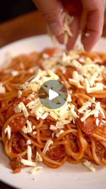 Filipino Recipes on Instagram: "Nothing hits the spot like a plate of Filipino spaghetti! 🍽️❤️ Sweet sauce, hotdogs, and cheese—perfection on a plate! 

Ingredients
* 1 large brown onion(minced)
* 6 cloves garlic(minced)
* 3 tbsp olive oil
* 1 lbs ground beef/pork
* 4 red Filipino hot dogs(sliced)
* 3 tbsp tomato paste
* 28 oz can crushed tomatoes
* 1 cup banana ketchup
* 2 tbsp fish sauce
* 1/2 cup evaporated milk
* 1/4 cup condensed milk
* Salt and pepper to taste
* Spaghetti Pasta
* Magnolia Cheese(substitute with white American cheese)

#FilipinoSpaghetti
#SarapNaSarap
#PinoyCuisine
#FilipinoFood
#ComfortFood
#Foodie
#SweetSpaghetti
#PastaLovers
#HomeCooking
#FilipinoDelights
#TastyEats
#GoodEats
#FoodLovers
#NoodleTime
#cookingathome" Filipino Spaghetti Recipe, Filipino Spaghetti, White American Cheese, Cheese Substitute, Can Crushed Tomatoes, Banana Ketchup, Filipino Dish, Condensed Milk Recipes, Spaghetti Recipe