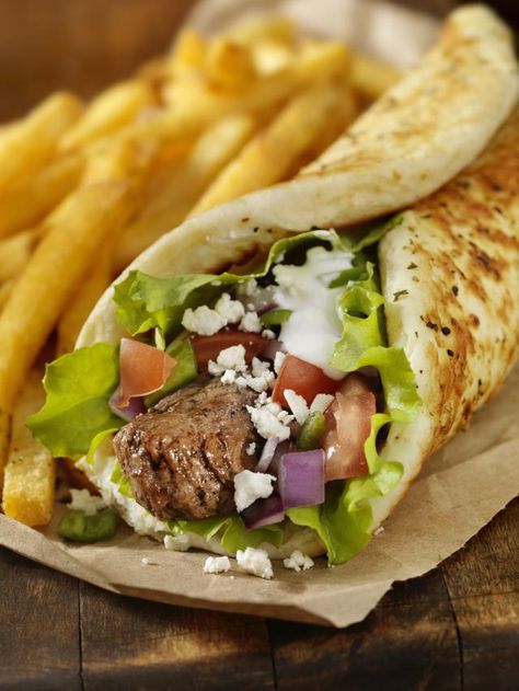 This great lamb recipe makes a fantastic pita sandwich. Keep your kebabs the width of your pita so you can slide the skewer off into your sandwich. Kebab Wrap, Lamb Kabobs, Dessert Restaurant, Pita Wrap, Lamb Kebabs, Leftover Pork, Doner Kebab, Kebab Recipes, Greek Dishes