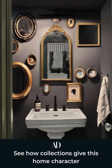 Tour this modern yet classic brownstone in Brooklyn, New York, and get inspired by the gallery walls, restored fireplaces, textured decor, and calming palette.  #mirror #frames #framing #gallerywall #gallery #powderroom #pedestalsink #linens #mauve #paint #dramatic #vanity #fixtures #brass #porcelain #guest #hosting #guestroom #guestbathroom #collecting #display #NYC Mirror Gallery, Mirror Gallery Wall, Brooklyn Brownstone, Dark Home Decor, Dark Home, Oval Mirror, Cheap Decor, Black Bathroom, A Mirror