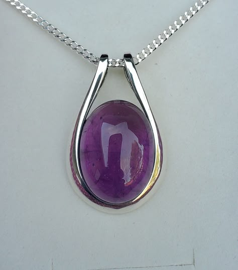 Gorgeous Natural Amethyst Necklace, 13x18mm Smooth Cabochon, See Video For Example Of Available Gems! You Can Ask to See Pendant Before Mailing. Being A Natural Stone, There Are Minor Variations That Do Not Affect Integrity. Sleek 925 Sterling Silver Pendant, Bezel Style, Incorporated Bail, Rhodium Plated, 20" Sterling Silver Chain (Chain Length Options Available By Messaging Seller For Availability At Time Of Purchase). Gift Box Included. *More Will Be Coming Soon! Big Gem Necklace, Gemstone Pendant Design, Amethyst Jewelry Necklace, Pendant With Stone, Gem Stone Necklace, Necklace With Stone, Jewelry Knowledge, Wire Wrap Jewelry Designs, Sweet Jewelry