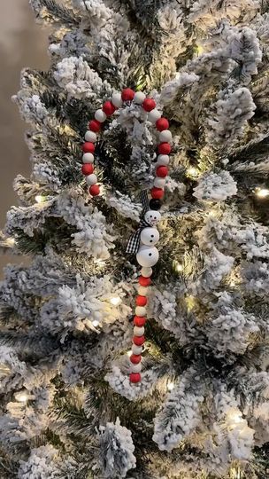 10K views · 2.5K reactions | DIY Beaded Snowman Candy Cane! 
.
.
.
#diy #diycraft #diychristmas #diychristmasdecor #diychristmascrafts #christmas #christmasdiy #christmascrafts #holidaycrafts | Rachael Clark Bead Candy Cane, Candy Cane Diy, How To Make Snowman, Beaded Snowman, Make Snowman, Beads Candy, 10k Views, Instagram Diy, Xmas Crafts