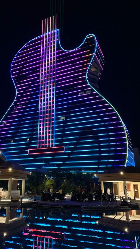 Seminole Hard Rock Hotel & Casino, Hollywood, USA — urdesignmag Rooftop Lighting, Sicilian Decor, Hard Rock Casino, Facade Lighting, Hard Rock Hotel, Car Upholstery, Amazing Buildings, Toy Art, Unique Buildings