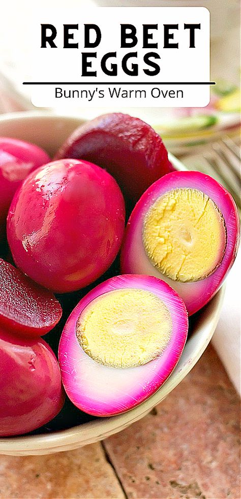 A Red Beet Egg sliced in half with whole eggs in a bowl. Red Beet Eggs Recipe, Red Beet Eggs, Pickled Beets And Eggs, Beet Eggs, Eggs Pickled, Pickled Eggs Recipe, Mennonite Recipes, Diy Easy Recipes, Pickled Eggs