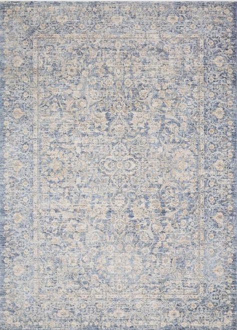 Renew your interior space with this transitional rug featuring a contemporary design with a distressed, vintage aesthetic in a cool, soothing color palette.