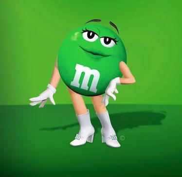 The Green M&M is a beloved and iconic character that has captured the hearts and imaginations of candy enthusiasts worldwide. With her vibrant green color, mischievous smile, and irresistible charm, she symbolizes fun and playfulness. The Green M&M first made her appearance in 1997 as part of a marketing campaign by Mars, Incorporated, the company ... Read more M&m Costume, Candy World, Peanut Chocolate, Miss Green, Astro Science, M&m Characters, Popular Candy, M Wallpaper, Green Characters