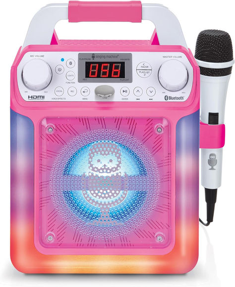 The Singing Machine Groove Mini Portable Karaoke System features voice effects, plays music via Bluetooth or line-in. MP4 & MP3+G ability to display lyrics on your TV. Features a built-in speaker and one wired microphone Sound Like a Star: Exciting features like echo control, two mic inputs for duets, recording and playback abilities, and LED lights will make it feel like you’re on stage! Connect to a TV via HDMI for visual lyrics so guests can sing along! Price:$38.71 FREE Returns 2000s Party Theme, Best Karaoke Machine, Mini Karaoke, Singing Games, Karaoke Speaker, Karaoke System, Karaoke Machine, Colored Led Lights, Karaoke Party