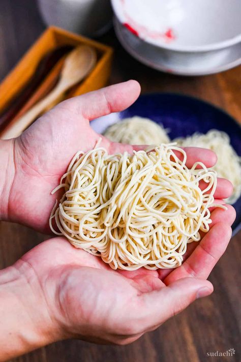 a bundle of homemade ramen noodles held in two hands Authentic Ramen Recipes, Ramen Noodles From Scratch, Ramen Homemade, Cooking Staples, Noodles From Scratch, Authentic Ramen, Homemade Ramen Noodles, Noodles Homemade, Handmade Noodles