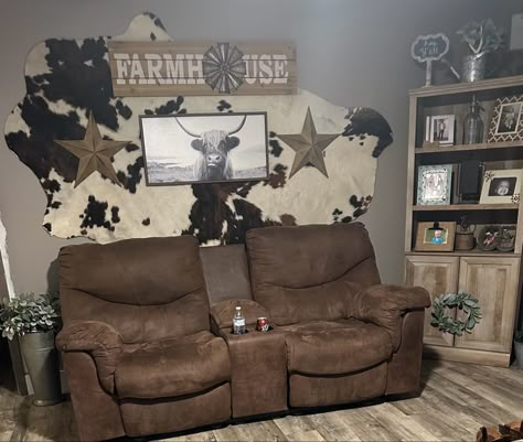 Farmhouse Cow Picture Decor, Western Theme Office Decor, Cow Hide Rug Ideas, Cowhide With Pictures On Wall, Cowhide Wall Decor Living Room, Cowhide On Wall Ideas Living Room, Cowhide Rug Wall Decor, Cowhide Rug On Wall Ideas, Cowhide Living Room Ideas